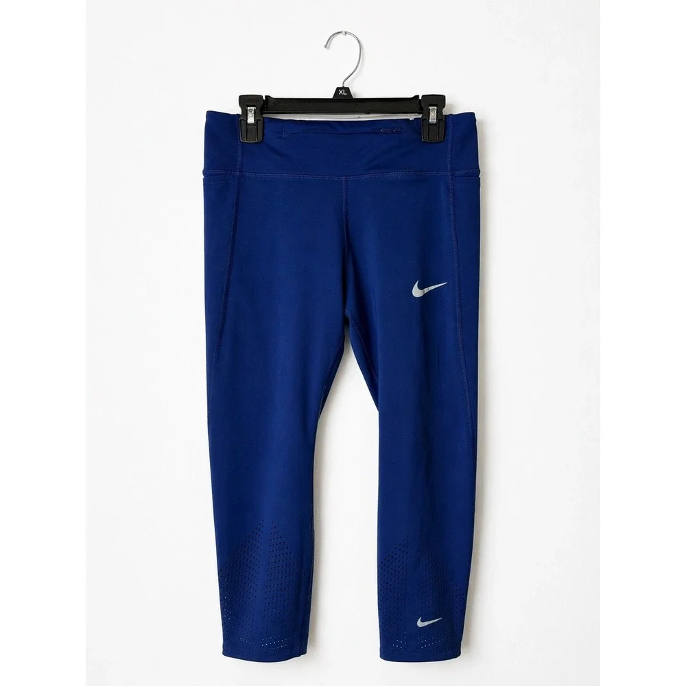 Nike Dri FIT Leggings Women Medium Blue Cropped Laser Cut Pockets‎ Athleisure